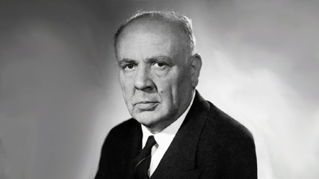 Ritratto storico in bianco e nero di Fernando Santi, dirigente sindacale e politico socialista, figura di riferimento per la tutela dei lavoratori e degli emigrati.